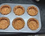 A picture of step 4 of Granola cups with fruit yogurt filling.