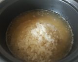 A picture of step 2 of Rice with Smoked Pork Loin, Egg, and Corn.