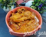 A picture of step 4 of Achari Chicken Masala.