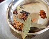 A picture of step 4 of Katla fish biryani in electric rice cooker.