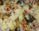 A picture of step 8 of Pitta bread pizza.