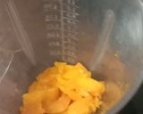 A picture of step 2 of Mango milk shake shots.