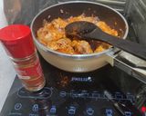A picture of step 4 of Chicken Pörkölt (Hungarian paprika stew).