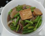A picture of step 11 of Braised tofu with french bean and onion.
