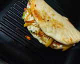 A picture of step 3 of Cheesy Fries wraps.