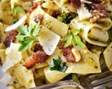 A picture of step 4 of Wild Garlic Pesto Pappardelle With Crispy Bacon & Pine Nuts.