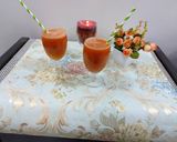 A picture of step 2 of Orange and carrot juice.