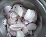 A picture of step 1 of Shahi paneer with white gravy.