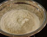 A picture of step 14 of Apple Spice Layer Torte with Caramel Mousse Filling and Frosting.