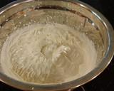 A picture of step 14 of Apple Spice Layer Torte with Caramel Mousse Filling and Frosting.