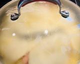 A picture of step 4 of Eggs with Canadian Bacon.