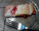 A picture of step 12 of Cherry Cream Crescent Log.