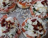 A picture of step 2 of Mini pizza.