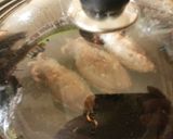 Foto del paso 11 de la receta Choquitos a la plancha en su tinta, con aceite de ajo y perejil