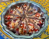 Une image de l'étape 12 de Salade de riz aux anchois, tomate, poivron et oignon rouge.