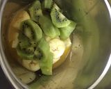 A picture of step 3 of Banana kiwi Smoothie with orange juice.