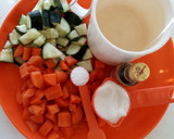 A picture of step 1 of Carrot and cucumber juice.