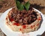 A picture of step 6 of Braised Lamb Shanks with Hummus Moutabal.