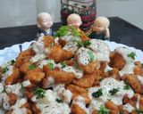 A picture of step 6 of Chicken Poppers with Cheesy Sauce.