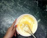 A picture of step 2 of Shahi mango khandvi with Mango rabari.