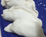 A picture of step 10 of Dudh Puli Rice dumplings cooked in milk.