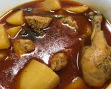 A picture of step 8 of Aloo chicken salan.