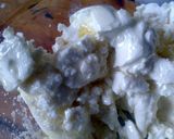 A picture of step 1 of Sig's Two Cheese Spread, Basil, Garlic and Olives.