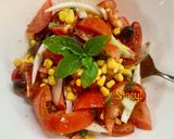 A picture of step 3 of Tomato Salad with Sweet Corn and Olives.