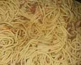 A picture of step 6 of Jollof spaghetti and chicken.