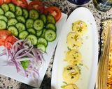 A picture of step 10 of Biryani with colourful salad.
