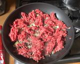 A picture of step 1 of Cottage pie with vegetable mash top and black cabbage.