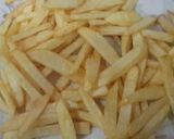 A picture of step 4 of Restaurant style cheese fries.