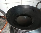 A picture of step 5 of Punjabi Style Bhindi Masala.