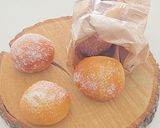 Une image de l'étape 5 de Beignets au four ultra moelleux.