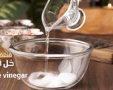 A picture of step 1 of Eggless Chocolate Cake.