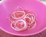 A picture of step 2 of Pickled Onions.