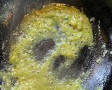 A picture of step 4 of Gondhoraj Dim / Eggs with Kafir Lime.