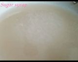A picture of step 1 of Coconut Burfi / Kobbari Mitai.