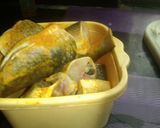 A picture of step 1 of Bengali Recipes Dhanya Patta Aar Kacha Lonka Rui Mach.