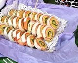 A picture of step 12 of Colorful pinwheel sandwiches.
