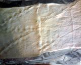 A picture of step 4 of Cherry Cream Crescent Log.