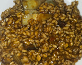 Foto del paso 9 de la receta: Arroz meloso de alcachofas y conserva de pota en su tinta
