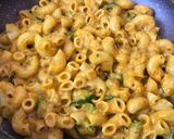 A picture of step 13 of Creamy Cheesy Schezwan Pasta.