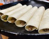 A picture of step 6 of Beefy Poblano Enchiladas.