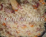 A picture of step 3 of Onion Rice.