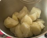 A picture of step 1 of Vermont Cheddar Mashed Potatoes.