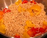 A picture of step 9 of Stir-Fried Instant Noodles with Stuffed Mushrooms.