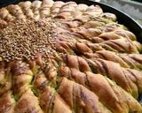 A picture of step 8 of Sunshaped garlic bread.