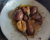 A picture of step 4 of Bharwa Masala Baingan.