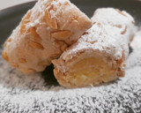 Foto del paso 10 de la receta: Bracito de gitano de merengue relleno de crema de limón